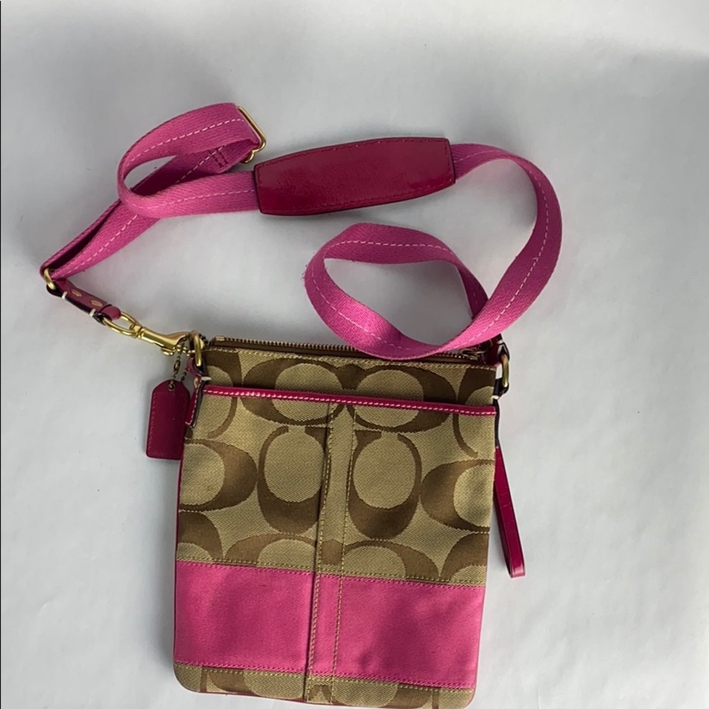 Coach cross body bag. Pink accent